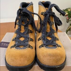 Clarks tan suede lace up boot with grey accents.